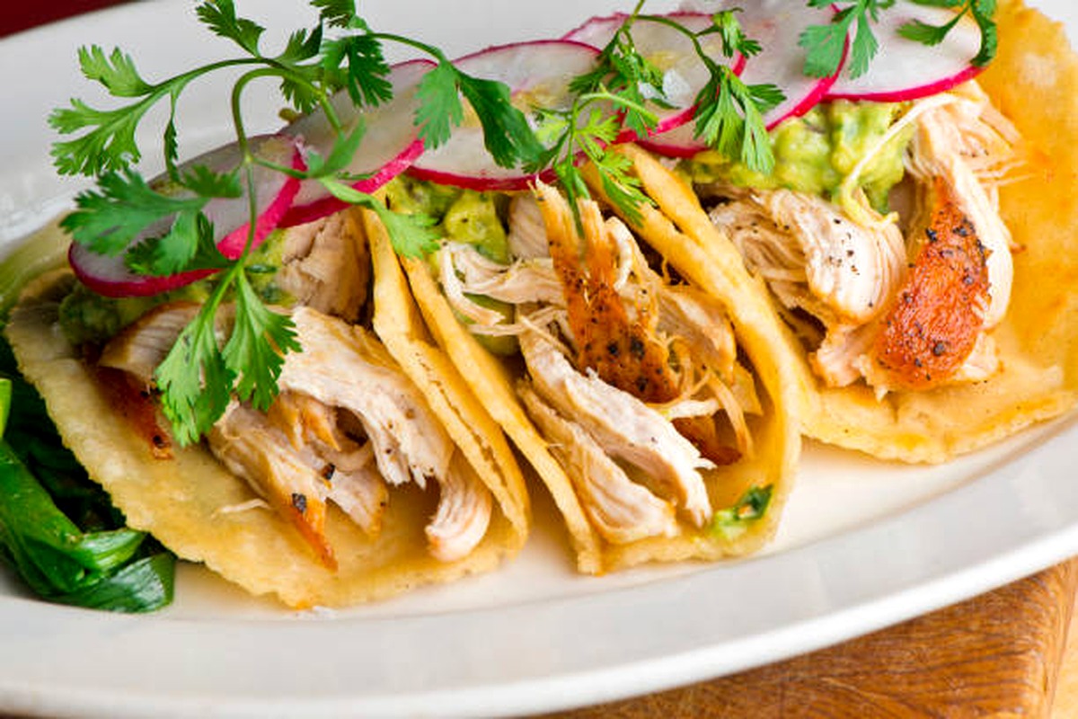 Three shredded chicken tacos
